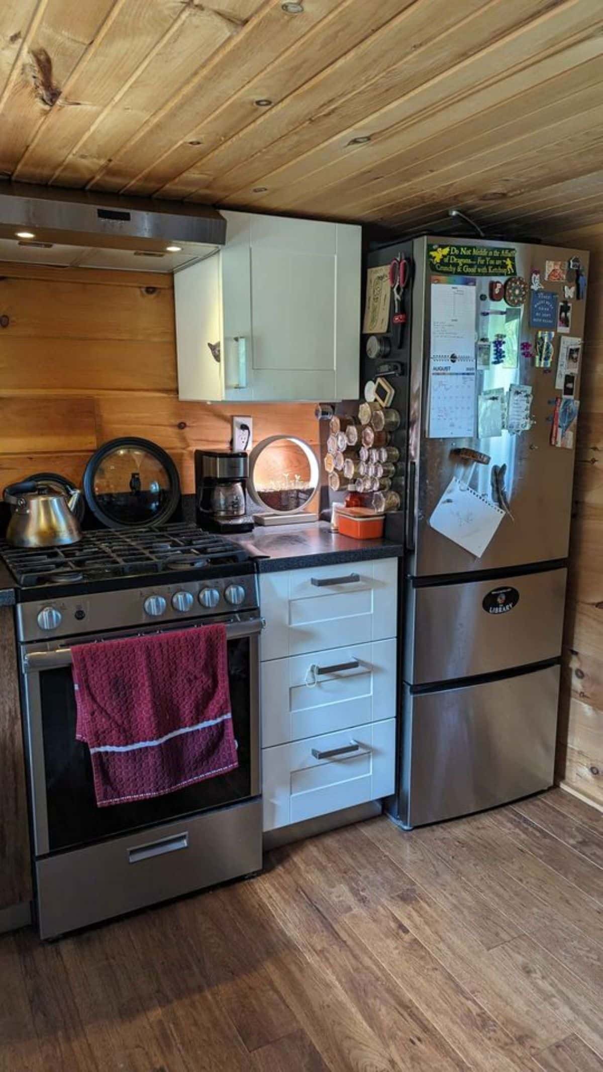 full fledged kitchen area of spacious tiny house in wheels