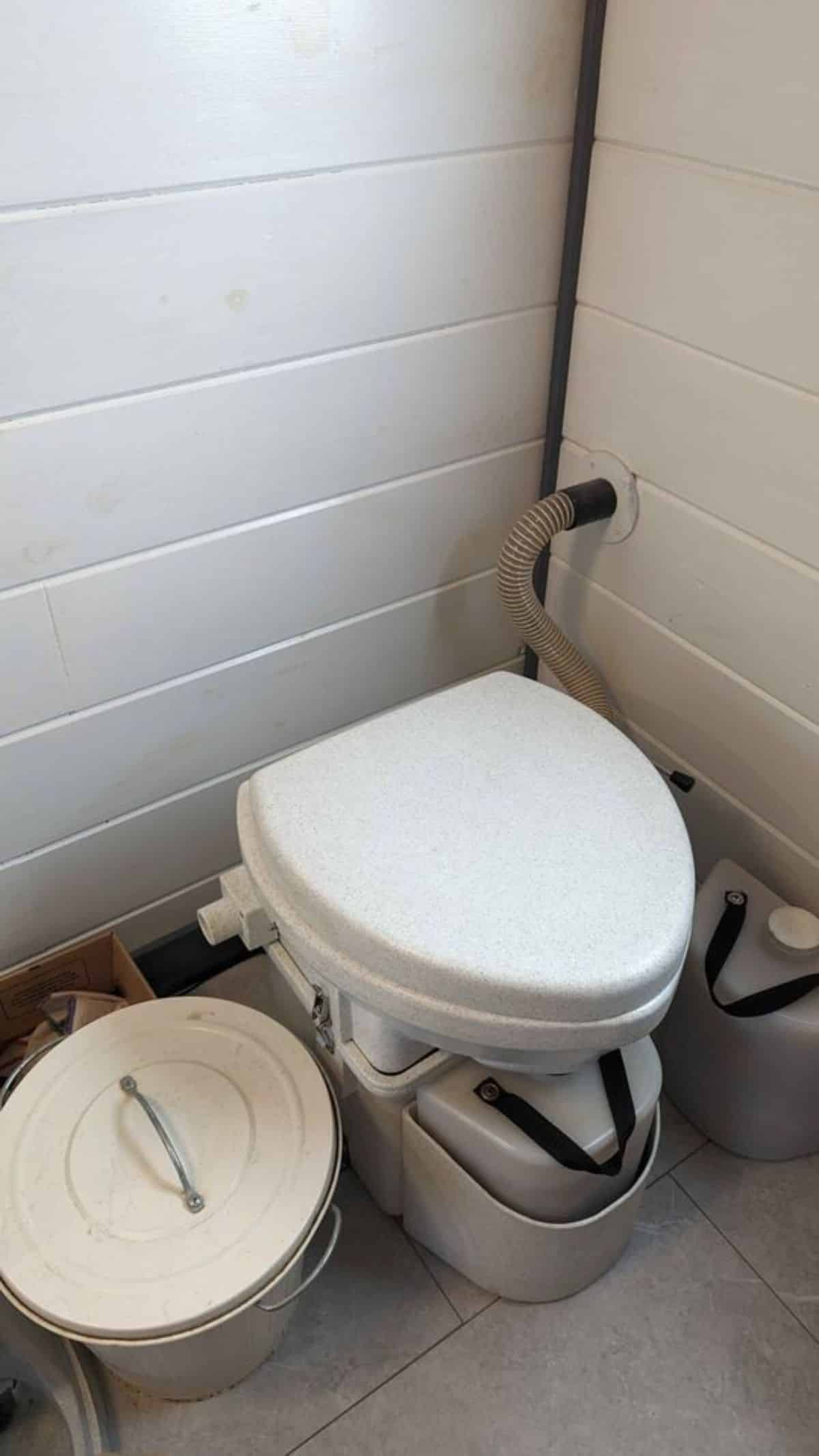 composting toilet installed in bathroom