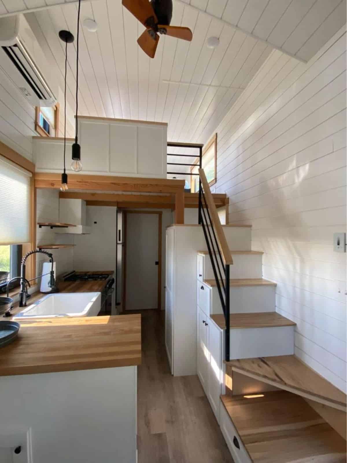 full length wooden interiors of tru form tiny home
