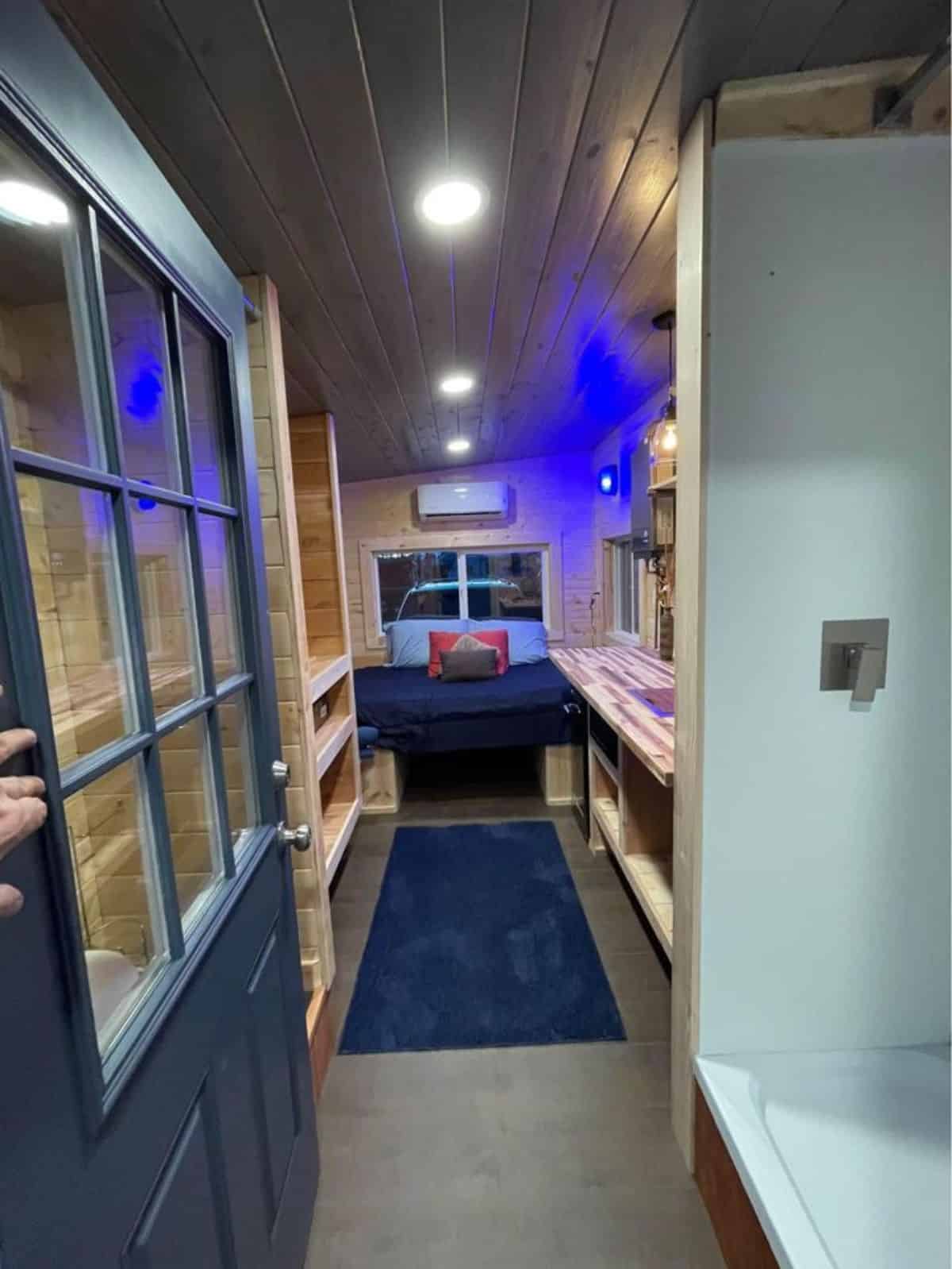 full length interior of 17' furnished tiny house