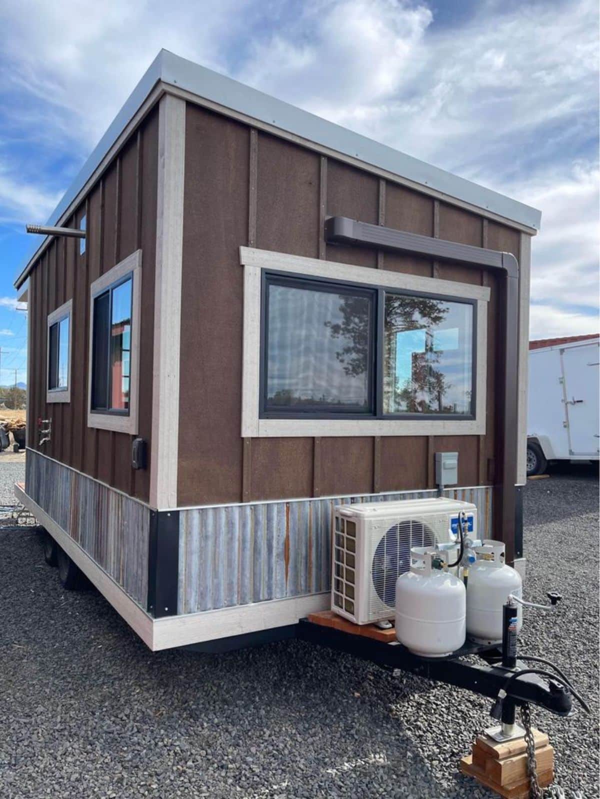 side view of 17' furnished tiny house from outside