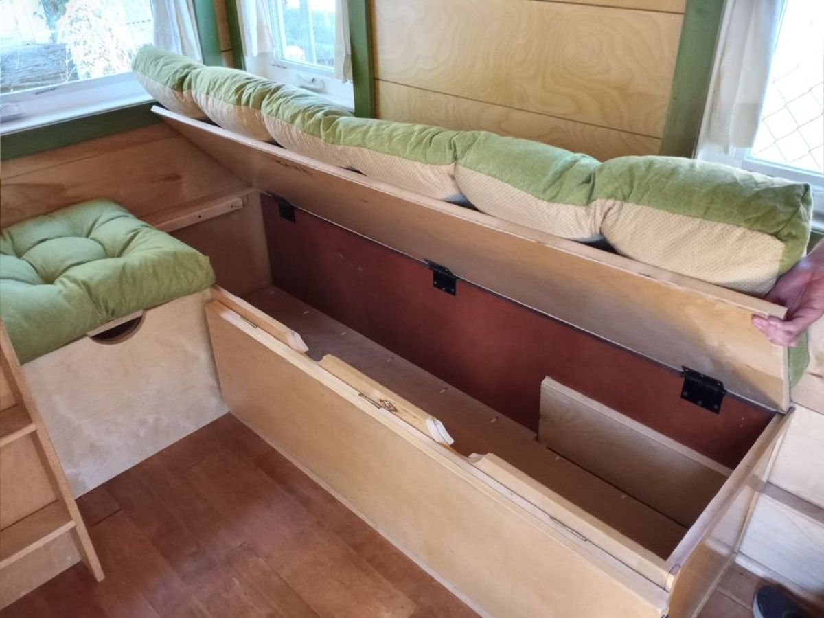 convertible couch into double bed with storage in living area