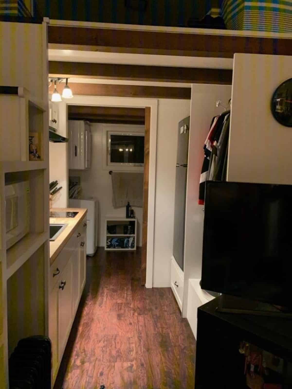 full length wooden interiors of 24' tiny mobile home
