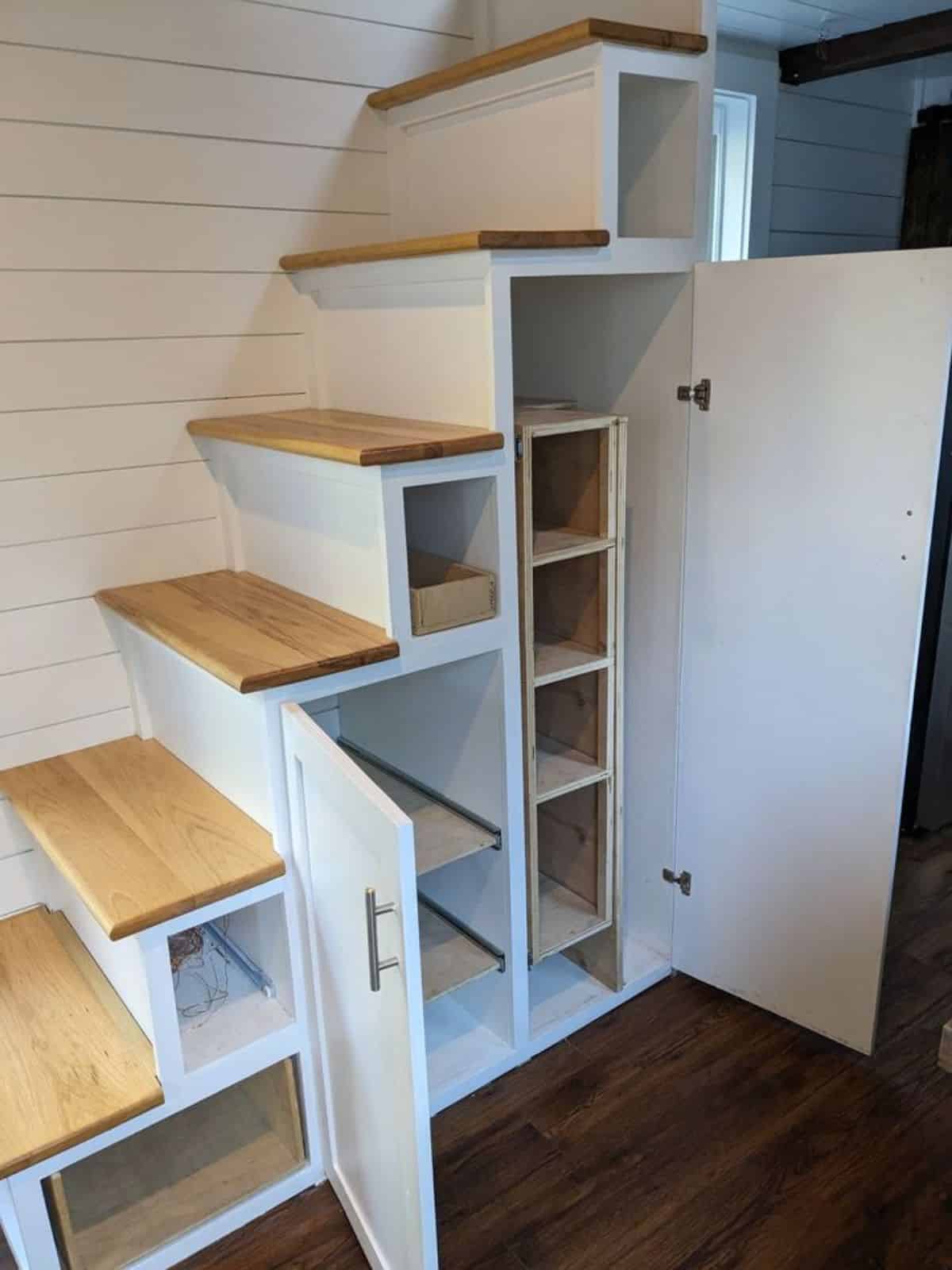 small kitchen countertop and multi purpose stairs
