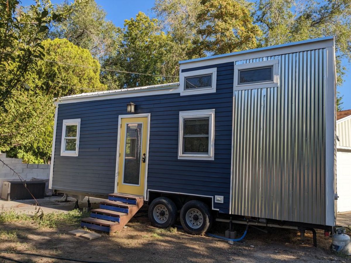 main entrance view of 26' tiny home on wheels