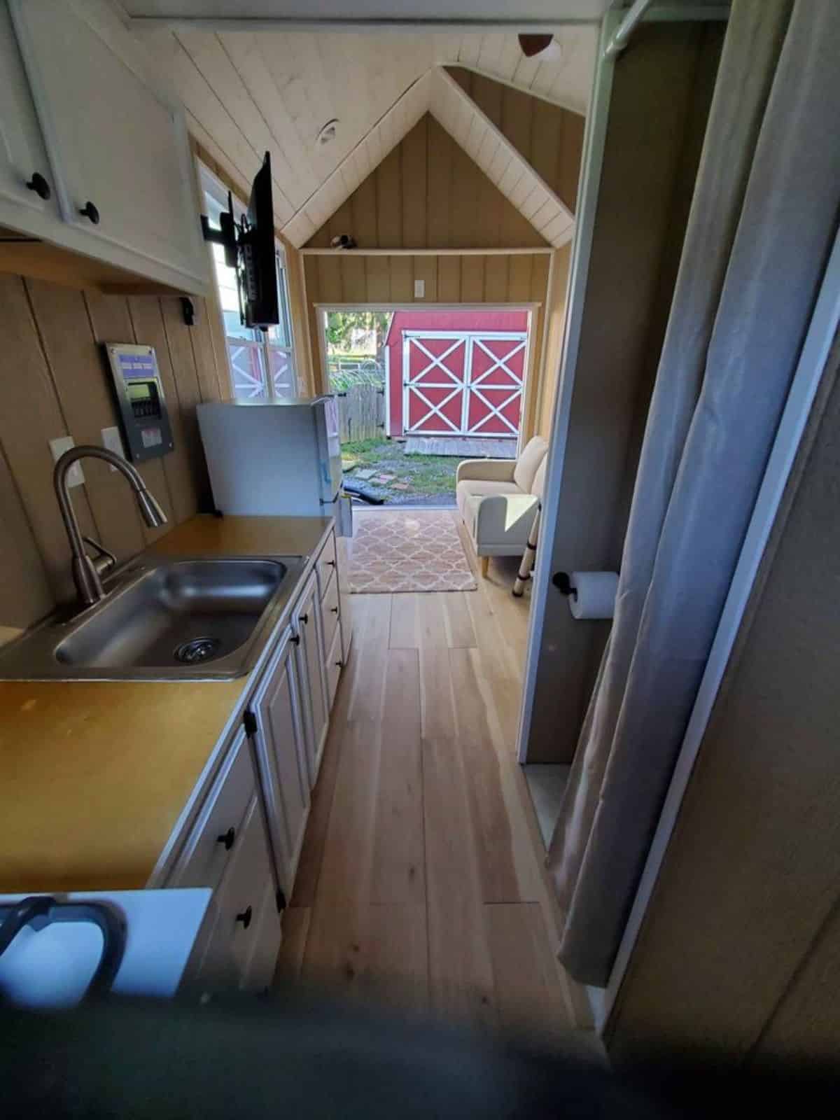 full length wooden interiors of ultra tiny home