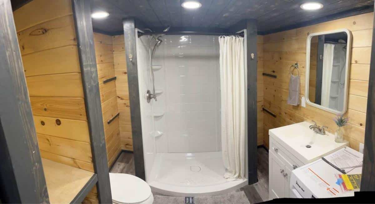 full length shower area in bathroom of 2 BR tiny home on wheels