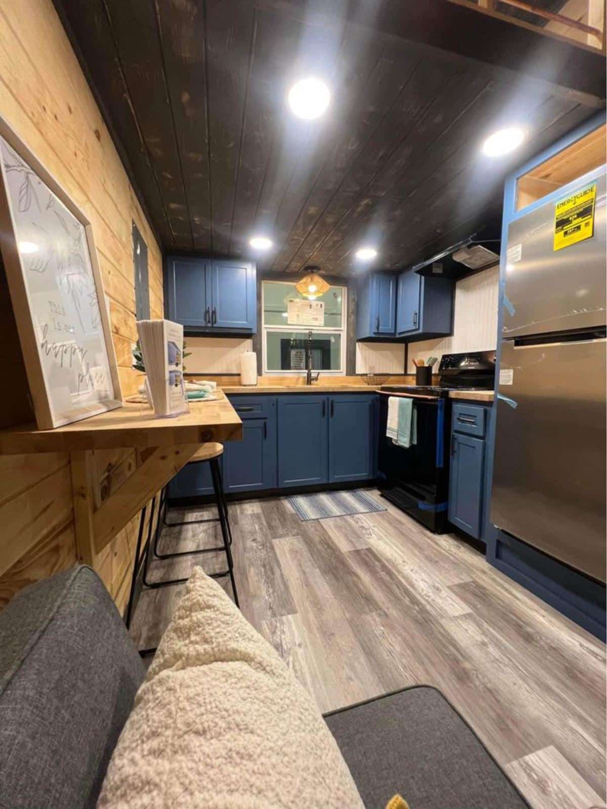 full length wooden interiors of 2 BR tiny home on wheels