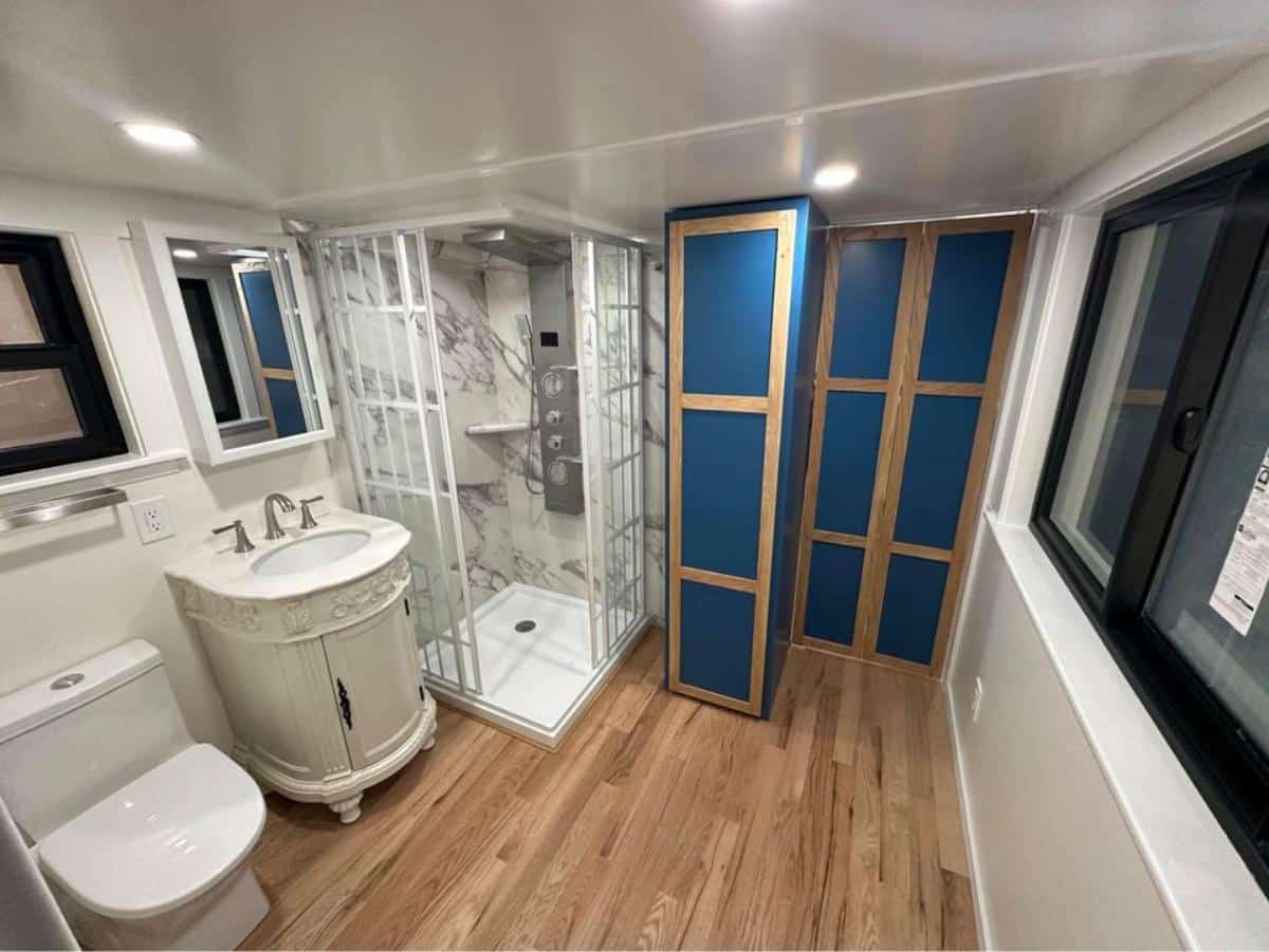 full length shower area with ample space in washroom